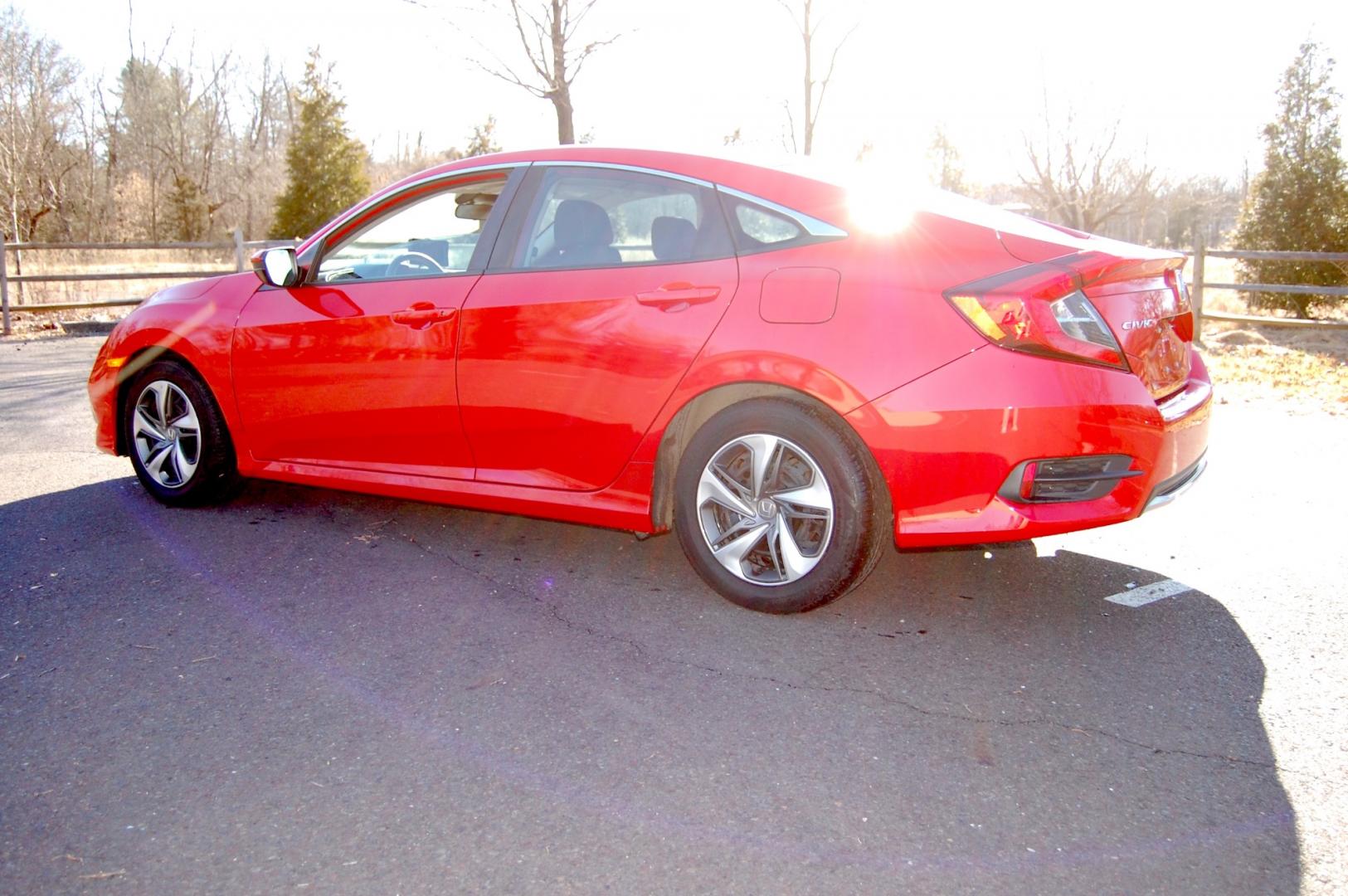 2019 RED /Black Cloth Honda Civic (2HGFC2F60KH) with an 2.0 Liter engine, Automatic transmission, located at 6528 Lower York Road, New Hope, PA, 18938, (215) 862-9555, 40.358707, -74.977882 - One family owned 2019 Honda Civic LX sedan powered by a 2.0 Liter 4 cylinder engine, front wheel drive, automatic transmission. Tilt wheel, cruise control, Dual front and side air bags, Side curtains airbags, ABS braking, AM/FM/Bluetooth/USB, Auto climate control, power windows, locks and mirrors, 1 - Photo#5